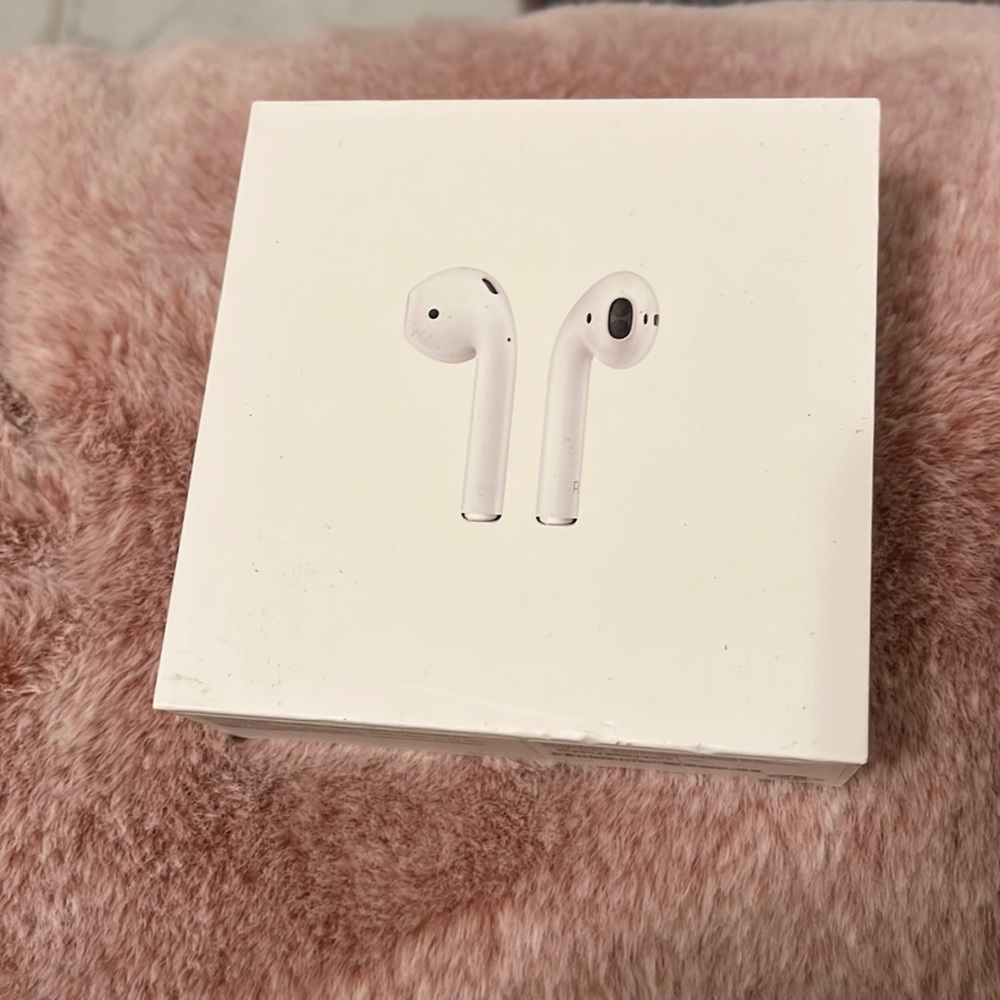 Apple AirPods. New, but box was opened.